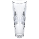 A clear glass vase with a flared rim and intricate sunburst patterns etched into its sides, against a white background.