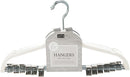 Set of six white velvet hangers with built-in clips, arranged in a row on a white background.