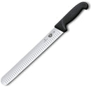 A close-up angled view of the Victorinox 12-inch slicing knife, showcasing its Granton blade and ergonomic handle.