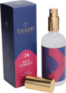 Close-up of the Trapp No. 24 Wild Currant Fragrance Mist packaging, highlighting the bold navy and red color scheme with refined branding.