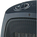 Brentwood Portable Ceramic Space Heater and Fan, as a rounded, compact design in a black color. The front features a black honeycomb grill protecting the ceramic heating element. On the top, there are two rotary dials for adjusting the thermostat and selecting the heat or fan mode. A small indicator light is also visible on the front.