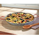 A round, silver-colored carbon steel paella pan with a hammered texture and two bright red handles. A brand label is visible on the surface.