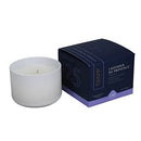 Trapp No. 25 Lavender de Provence 3.75 oz candle in a sleek white glass container, placed next to its signature navy and lavender box.