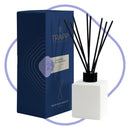 Trapp No. 25 Lavender de Provence 4 fl. oz. reed diffuser kit, featuring a white square glass bottle with black reeds, next to its elegant navy blue packaging.