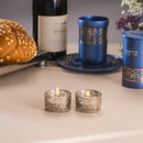 Glass Shabbat tea light holders with silver pomegranate metal decoration, compact and elegant for candle lighting
