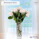 A clear, cylindrical glass vase or drinking glass with a textured, woven basket-like pattern covering its entire surface, set against a white background.