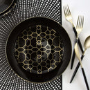 Laura Ashley designer round plate, black with elegant gold geometric trellis pattern and a central white floral motif, 10 pieces.