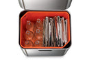 A two-tiered stainless steel trash and recycling bin with a black lid and base. The top compartment has a small, horizontal orange light on its front.