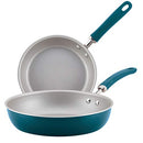 Blue nonstick frying pan set with stainless steel and silicone handles, includes one 9.5-inch and one 11.75-inch pan, displayed on a white background.