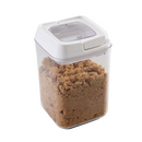 Kitchen Details 0.9L airtight food storage container made of clear plastic, allowing visibility of the brown sugar stored inside. The container features a white, easy-locking lid designed to keep contents fresh.