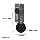 Packaged Home Basics measuring spoon set, including eight black plastic spoons of different sizes attached to two metal rings.