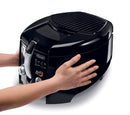 A black and silver De'Longhi deep fryer with a rounded design. The front panel features a control knob, a viewing window, and an "Easy Clean" button. The lid has a ribbed texture and a handle is visible on the side. The "ROTO FRY" logo is prominent on the front.