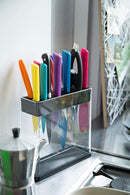 Sleek and functional knife storage solution from Kuhn Rikon, a transparent block with black accents that keeps knives organized and visible.
