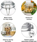 Clear glass Fido jar with a dark blue plastic lid insert and a metal wire clamp closure.