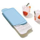 OXO Good Grips ice cube tray with sliding lid and rounded cube design on a white background.