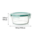 OXO Good Grips 7-cup round glass food storage container with airtight locking lid on a white background.