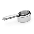 Set of four stainless steel oval measuring cups with stamped handles from Cuisipro, includes 1/4 to 1 cup sizes
