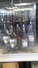 stainless steel flatware set with black handles, including spoons, forks, and a knife, displayed in a clear packaging with a metal stand.