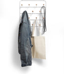 White Umbra Estique over-the-door multi-use organizer with 14 hooks featuring natural wood ends, shown against a white background.