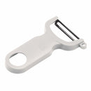 A white plastic vegetable peeler with a horizontal carbon steel blade and an ergonomic handle with a large hanging hole.