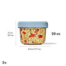 OXO Good Grips 20 oz Twist & Stack containers 2-pack with twistable leakproof lids on a white background.