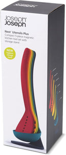 A complete, multicolored kitchen utensil set neatly stacked and stored on a black magnetic stand.