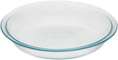 Pyrex clear glass pie plate, 9 inches wide and 1.2 inches deep, shown on a white background.