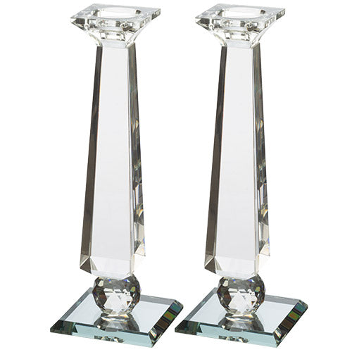 Pair of clear faceted crystal candlesticks with square bases.