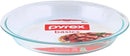 Pyrex clear glass pie plate, 9 inches wide and 1.2 inches deep, shown on a white background.