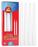 Four tall white tapered candles standing upright on a white background, ideal for Passover seder use.