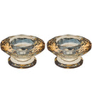 Pair of 7.5cm gold faceted crystal candlesticks.