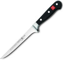 Wüsthof 6-inch boning knife with a narrow stainless steel blade and a black ergonomic handle, displayed on a white background.