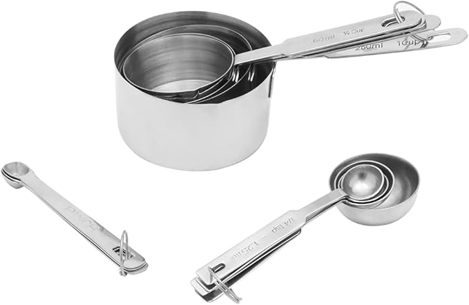 Home Basics 11-piece stainless steel measuring cups and spoons set fanned out on a white background.