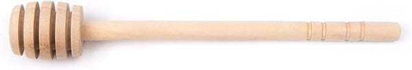 Wooden honey dipper with grooved head and brown finish on a white background.