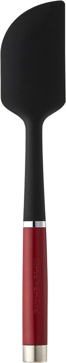 KitchenAid red silicone jar spatula with a long handle and narrow flexible head, shown on a white background.