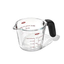 OXO Good Grips 1-cup borosilicate glass measuring cup with clear markings and black non-slip handle shown on a white background.