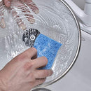 A stacked pile of three rectangular, dual-sided cleaning sponges. Each sponge has a light blue absorbent cellulose side and a dark blue non-scratch scouring pad side.