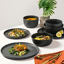 Truffle gray 16-piece stoneware dinnerware set with dinner plates, salad plates, soup bowls, and smaller bowls on a white background.