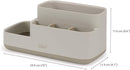 Joseph Joseph EasyStore bathroom caddy in ecru with divided compartments.
