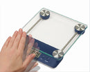 Blue digital kitchen scale with glass platform, touchless tare, and LCD display