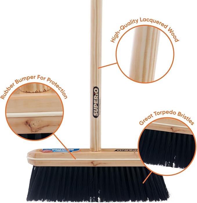 Superio kitchen broom with black tampico bristles and wooden handle on a white background.