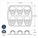 Dimensions for Nordic Ware bronze skull-shaped cakelet pan with six detailed cavities on a white background.