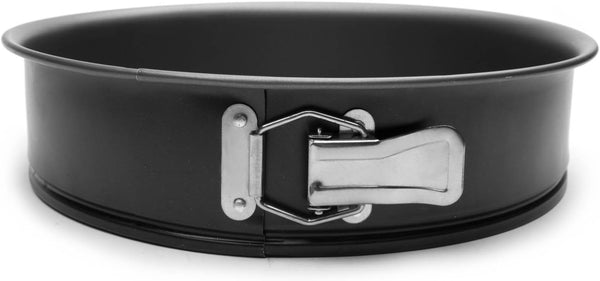 A silver, non-stick 10-inch springform cake pan with a quick-release latch.