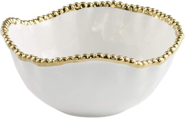 White porcelain salad bowl with gold beaded rim on a white background.
