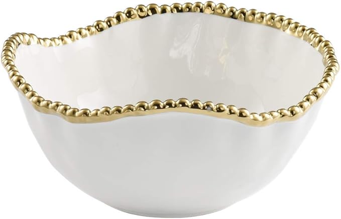White porcelain salad bowl with gold beaded rim on a white background.