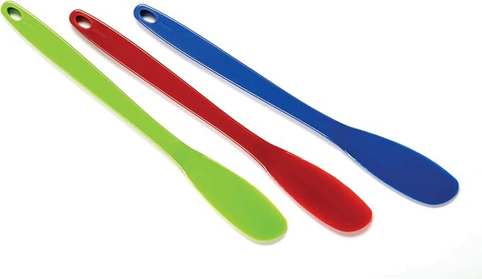 Set of three large Norpro spatula scrapers with flexible heads and sturdy handles displayed on a white background.