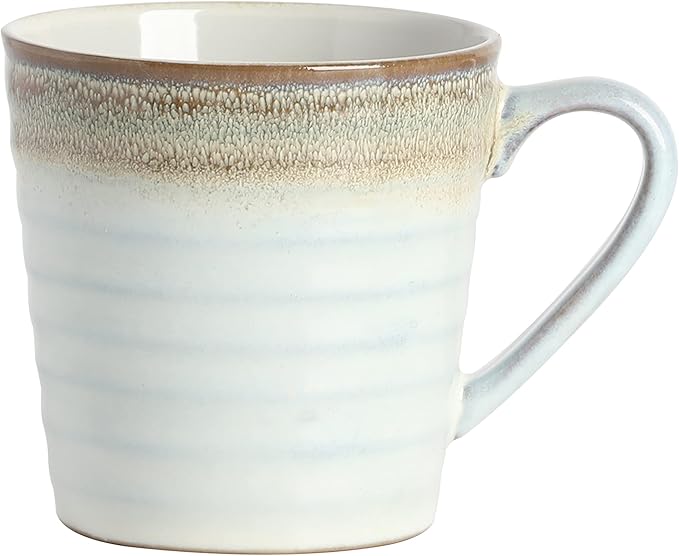 Mug: Taupe stoneware mug with a comfortable handle and reactive glaze finish, displayed on a white background.