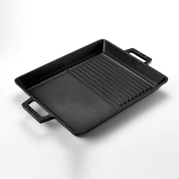 Slate black enameled cast iron grill and griddle combination pan with integrated handles on a white background.