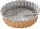 Nordic Ware Charlotte Cake Pan in toffee color with a fluted, ring-shaped design, displayed on a white background.
