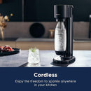A black SodaStream Gaia machine with a removable carbonating bottle, designed for ease of use and quick sparkling beverage creation.